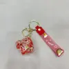 Creative aircraft oil filling keychain, exquisite and cute quicksand floating bottle, schoolbag pendant accessory, car key pendant Application Scenario